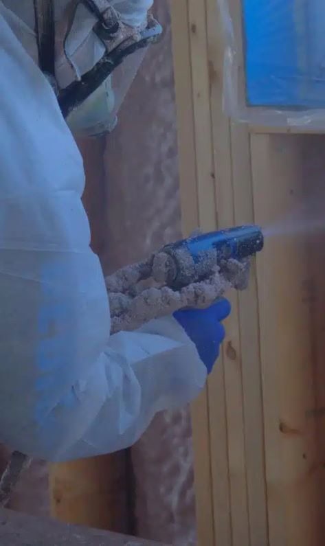FOAMIT Spray Foam Insulation Contractor in Action – Toronto Home Spray foam insulation expert from FOAMIT applying insulation in a Toronto residential property.